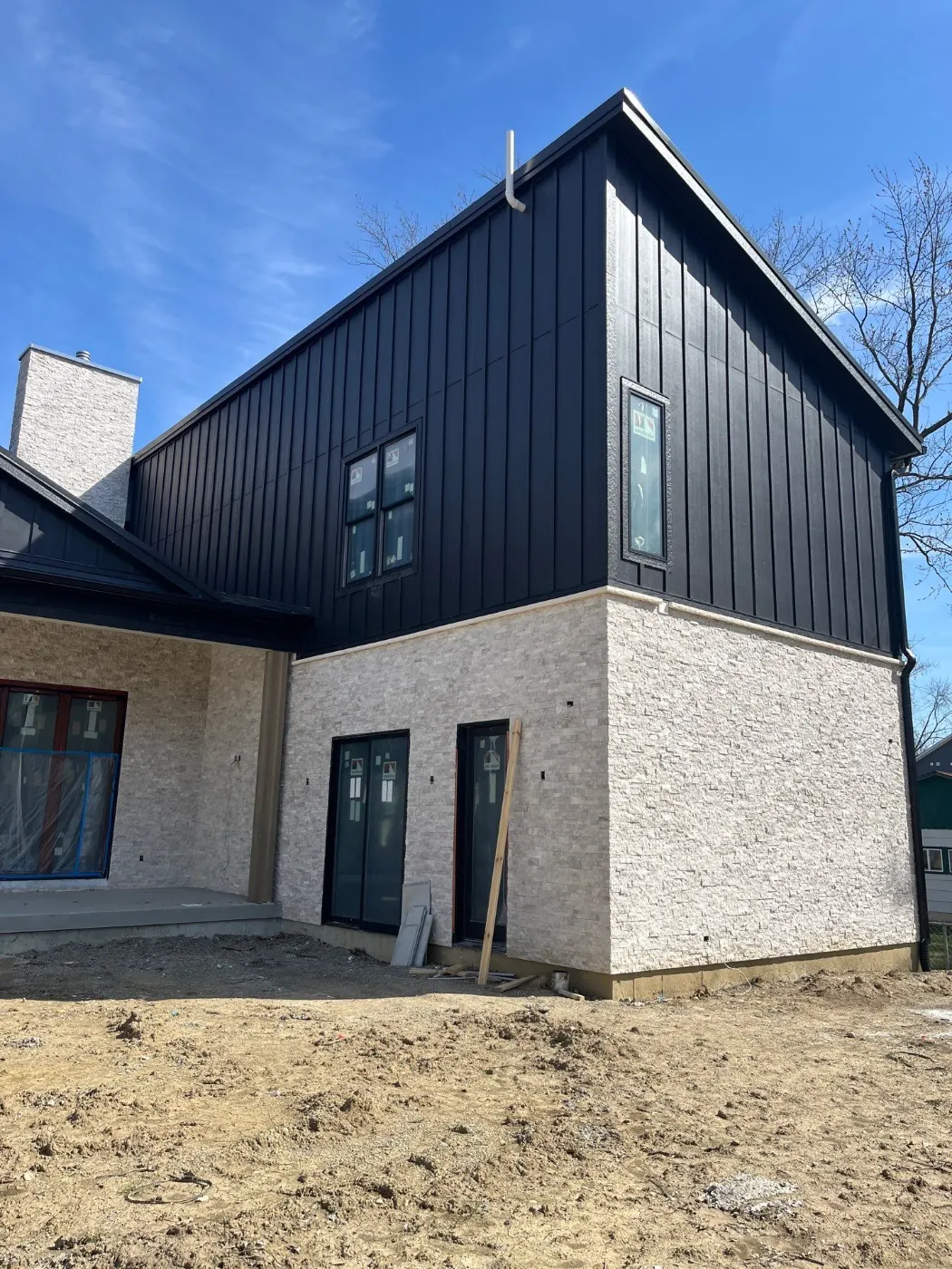 Siding installation documented in Heather Knoll